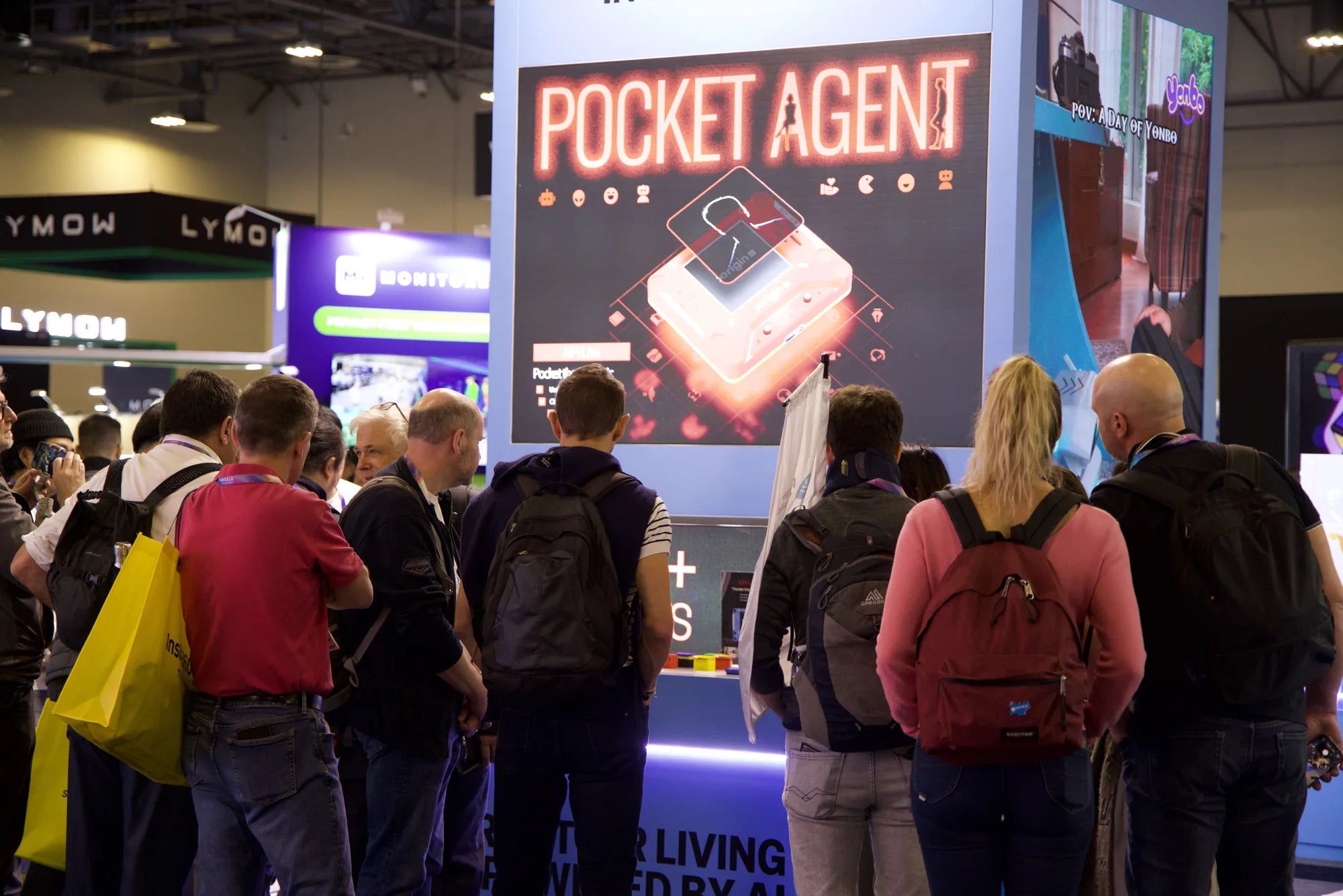 Visitors gathering around the AIPI exhibition booth at CES 2026